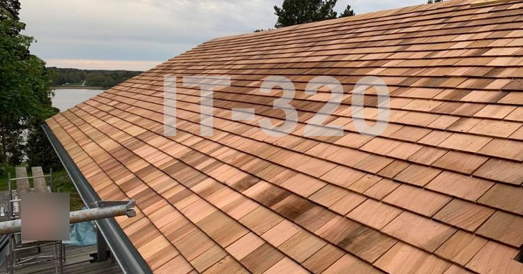House roof with red cedar shingles.